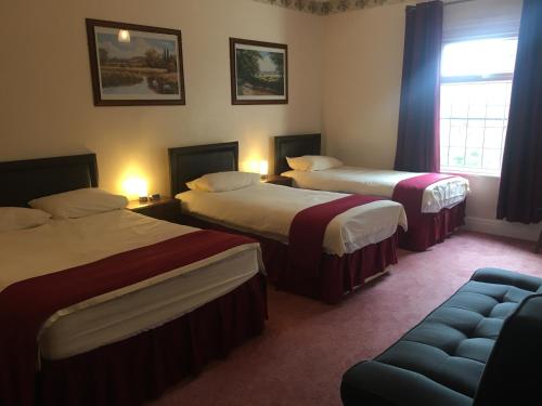 圣树酒店客房内的一张或多张床位