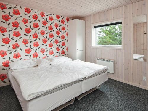 Three-Bedroom Holiday home in Rømø 35客房内的一张或多张床位