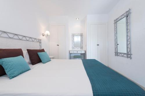 Palm Beach - Excel Hotels & Resorts客房内的一张或多张床位