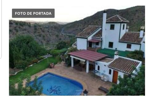 Apartamento en Cortijo totalmente reformado en pleno paraje natural Junto al Caminito del Rey y los sectores mas importantes de escalada A solo 2 minutos de la Estacion de tren内部或周边泳池景观