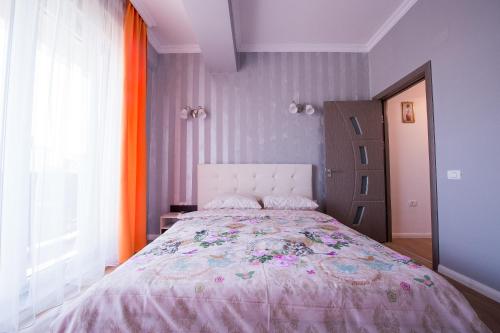 Apartel Nickos客房内的一张或多张床位