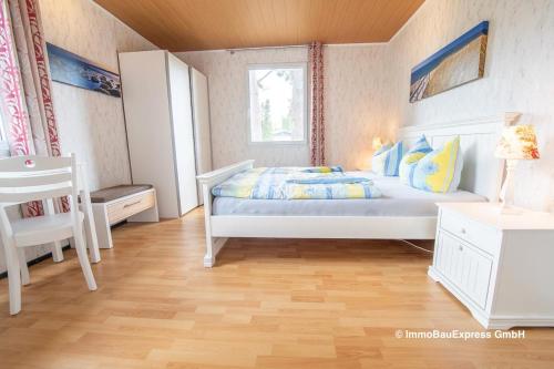 "Waldpark Fuhlendorf"客房内的一张或多张床位
