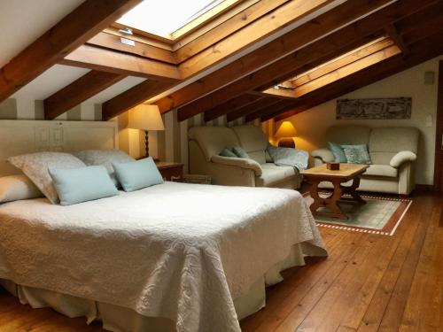 Posada La Llosa de Somo客房内的一张或多张床位
