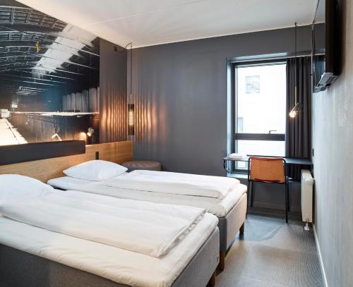 Zleep Hotel Aarhus Skejby客房内的一张或多张床位