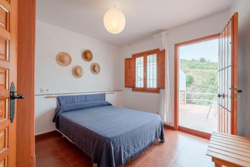 Casa Rural La Gomera客房内的一张或多张床位