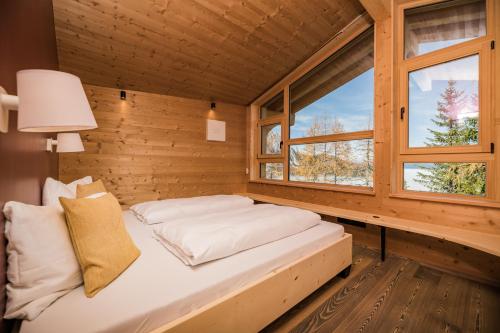 Rotwandwiesen Chalets SKI IN/OUT - 1900mt客房内的一张或多张床位