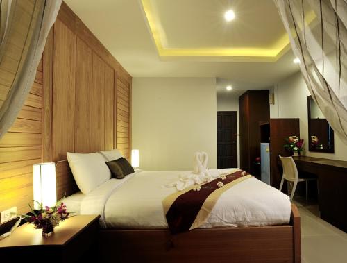 Suppamitr Villa Hotel客房内的一张或多张床位