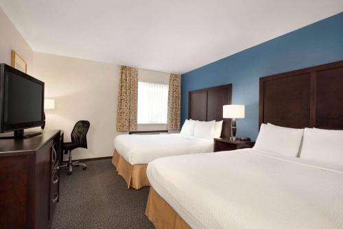 基洛纳戴斯酒店客房内的一张或多张床位