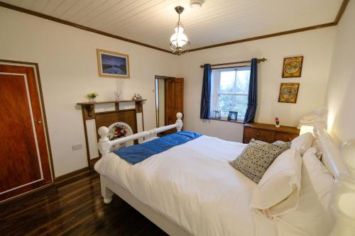 The Cottage Hillside客房内的一张或多张床位