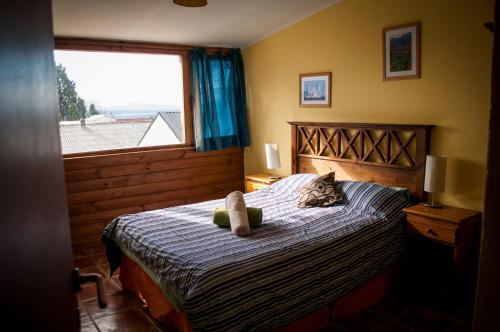 Patagonia Jazz Hostel客房内的一张或多张床位