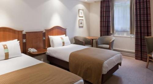 曼彻斯特机场酒店及Spa客房内的一张或多张床位