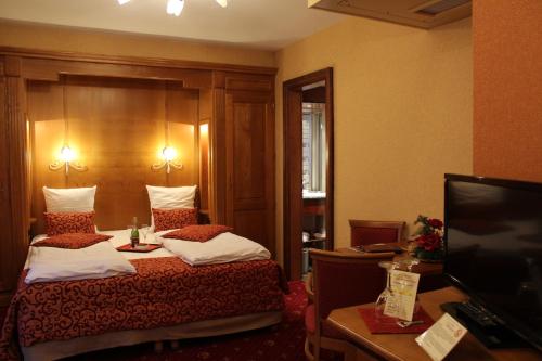 米特维尔酒店客房内的一张或多张床位