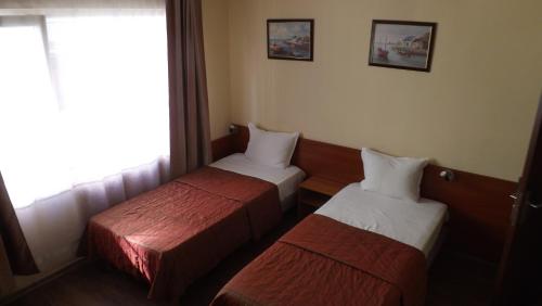Hotel Palitra客房内的一张或多张床位