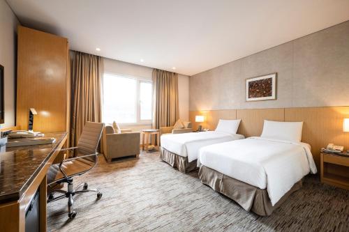 首尔斯坦福酒店客房内的一张或多张床位