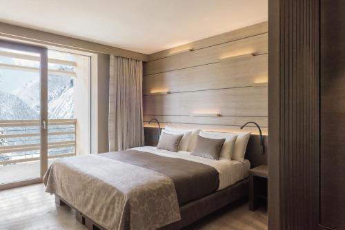 Lefay Resort & SPA Dolomiti客房内的一张或多张床位