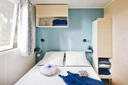 帕迪玛朵野营酒店客房内的一张或多张床位