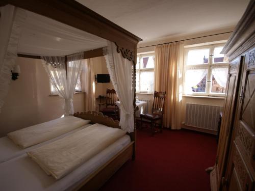 伊斯恩鲁格酒店客房内的一张或多张床位