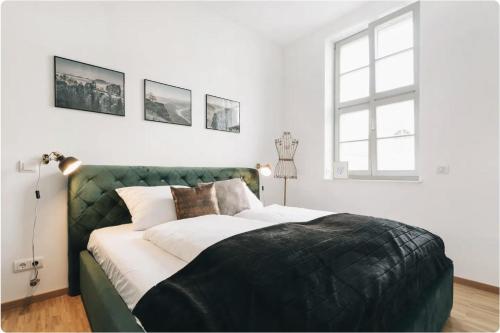 Apartment direkt an der Frauenkirche, Jüdenhof, FEWO-Residenz-Dresden客房内的一张或多张床位