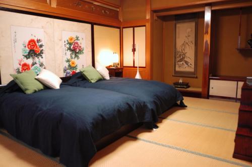 亚苏三馆日式旅馆客房内的一张或多张床位