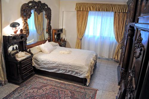 Grand Museum Guest House客房内的一张或多张床位