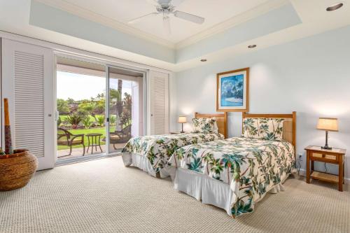 The Islands at Mauna Lani Point - CoralTree Residence Collection客房内的一张或多张床位