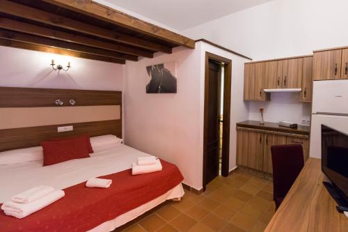 拉方达德尔罗西奥乡村旅馆客房内的一张或多张床位