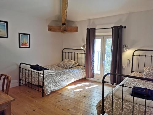 Maison d' Alys entre Luberon et Alpilles客房内的一张或多张床位