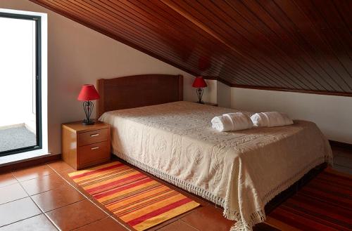 Abrigo da Montanha - Alojamento Familiar客房内的一张或多张床位