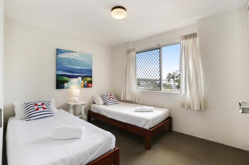 海岬公寓客房内的一张或多张床位