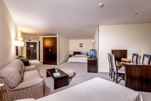 Hotel Bellevue Ski & Relax - Half Board客房内的一张或多张床位