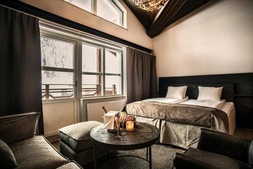 艾利克斯加登斯山区酒店客房内的一张或多张床位