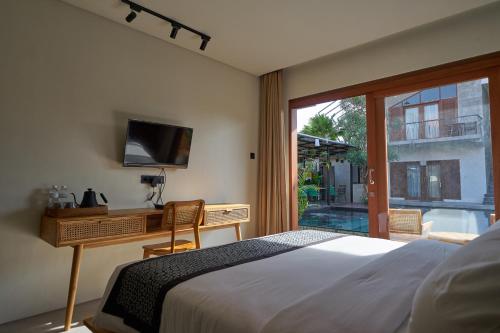 库布热带旅馆客房内的一张或多张床位