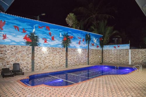 Hotel Cayapo内部或周边的泳池