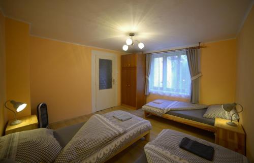 Domček 555客房内的一张或多张床位