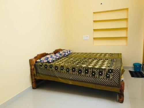 Rohit Home Stay客房内的一张或多张床位