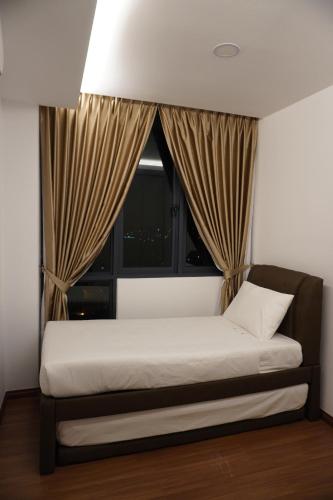 Luco Apartments @ Viva City Megamall客房内的一张或多张床位