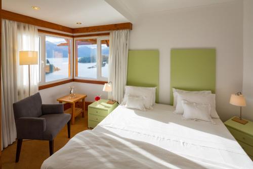 Hostería Isla Victoria Lodge客房内的一张或多张床位
