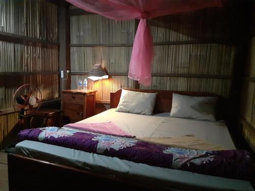 Tribal Village Homestay & Trekking客房内的一张或多张床位