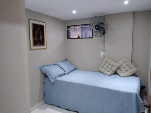 Apartamento Praia do Forte VIP客房内的一张或多张床位