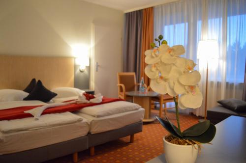 哈兹霍赫CAREA皇宫酒店客房内的一张或多张床位