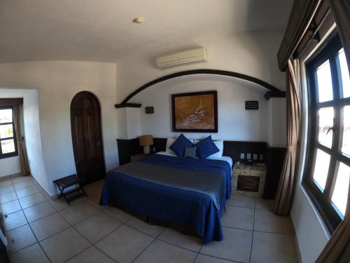 The Latit Hotel Querétaro客房内的一张或多张床位