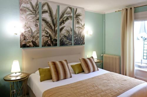 Hotel Les Pasteliers客房内的一张或多张床位