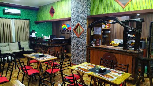 Residencial Arcoiris餐厅或其他用餐的地方