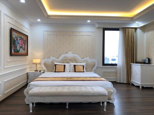 Tung Duong Hotel客房内的一张或多张床位