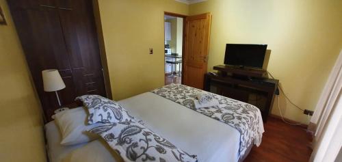 Apart Hotel Uman客房内的一张或多张床位