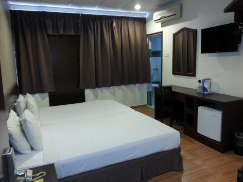 Goodhope Hotel Gurney, Penang客房内的一张或多张床位