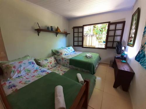 Casa inteira Ilha Grande客房内的一张或多张床位