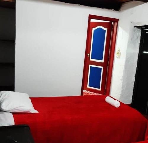 EL COCUY - HOSTAL-CHOCUY客房内的一张或多张床位