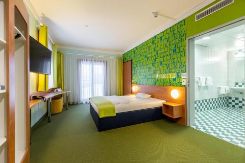 Hotel Fränkische Schweiz-Pegnitz客房内的一张或多张床位