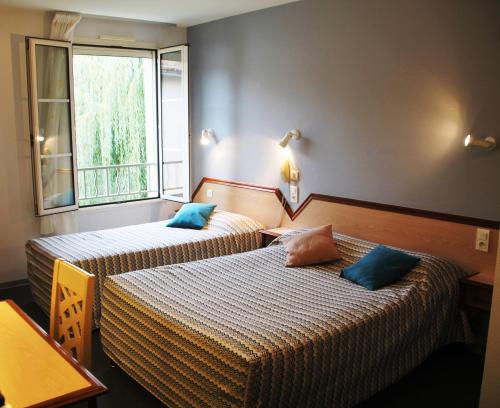 罗迪斯切瓦尔布兰科克洛维斯酒店客房内的一张或多张床位